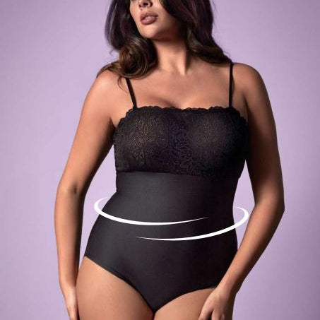 Woman wearing Janira Body Lace Perfect Curves in black, showcasing seamless full-body shapewear with lace detailing and waist support.