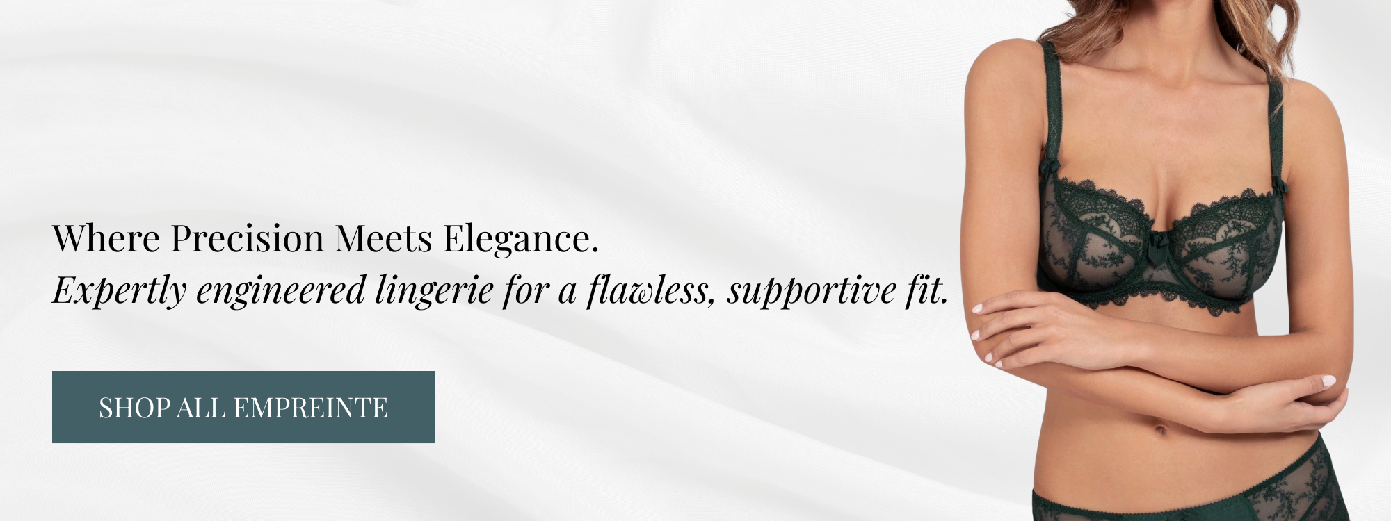 Model in green Empreinte full cup lace bra showcasing elegant design and supportive structure.