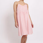 Model wearing Passionflower Frilly Nightie in coral stripe, featuring a square neckline, frill trim, and breezy cotton fit.