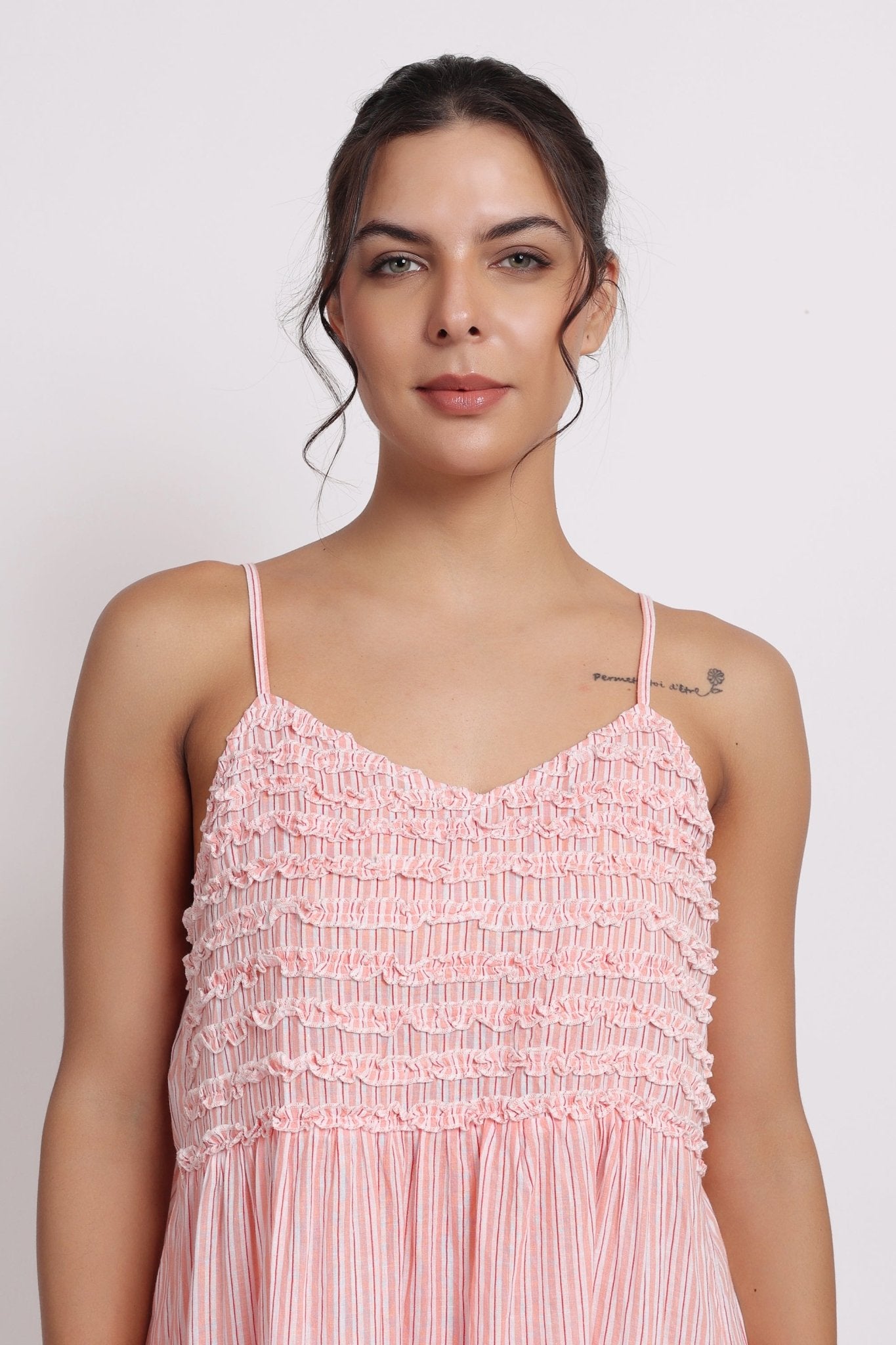 Close-up of Passionflower Nightie neckline, featuring frill edge and coral striped lightweight cotton fabric.