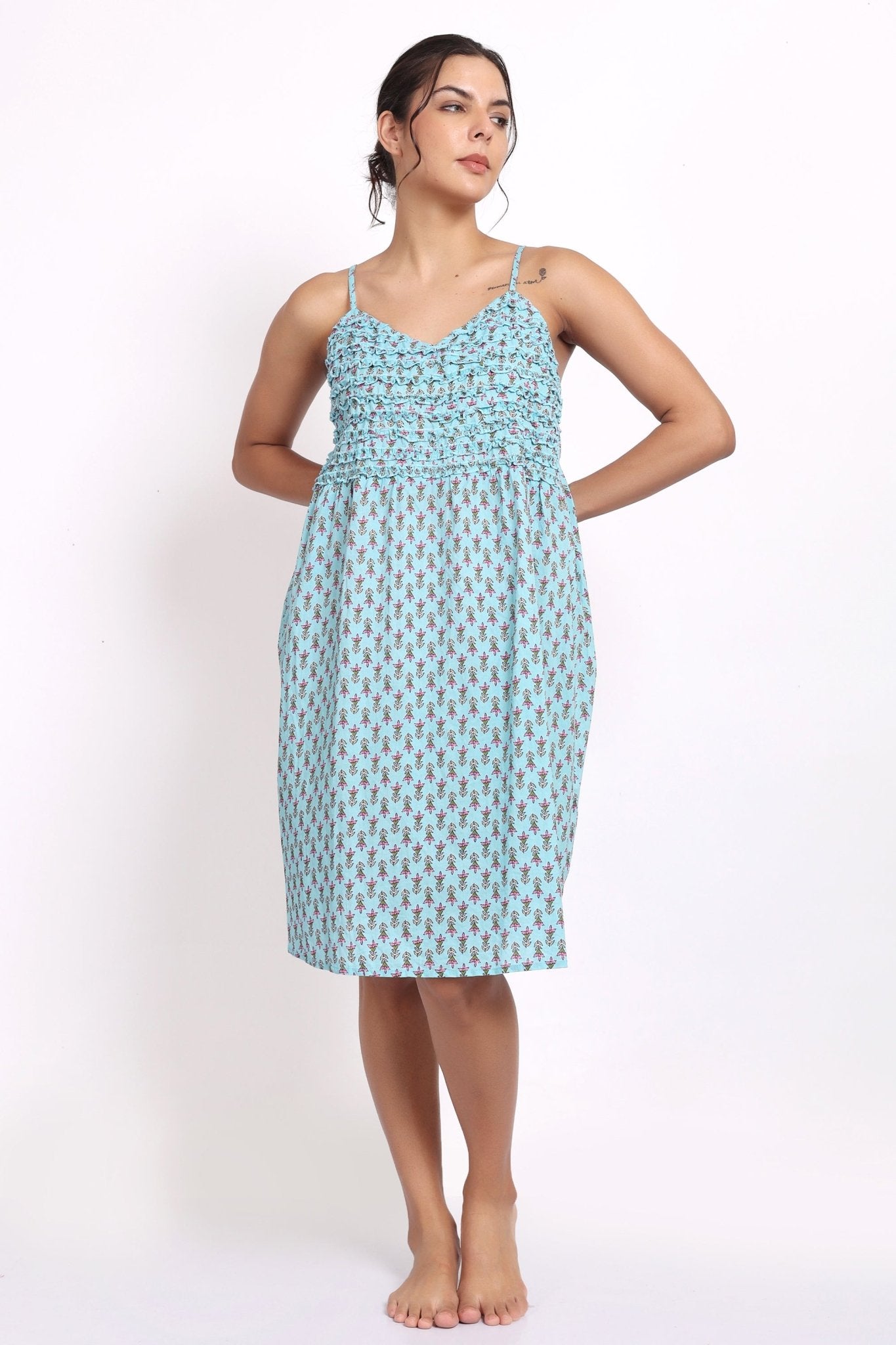 Model wearing Bloom Frilly Nightie in aqua small floral print, a lightweight cotton summer nightdress with frill straps.