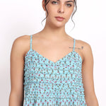 Close-up of neckline detail and floral print on the Bloom Frilly Nightie in aqua cotton voile.