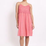 Model wearing coral self-stripe frilly nightie with spaghetti straps, front view.