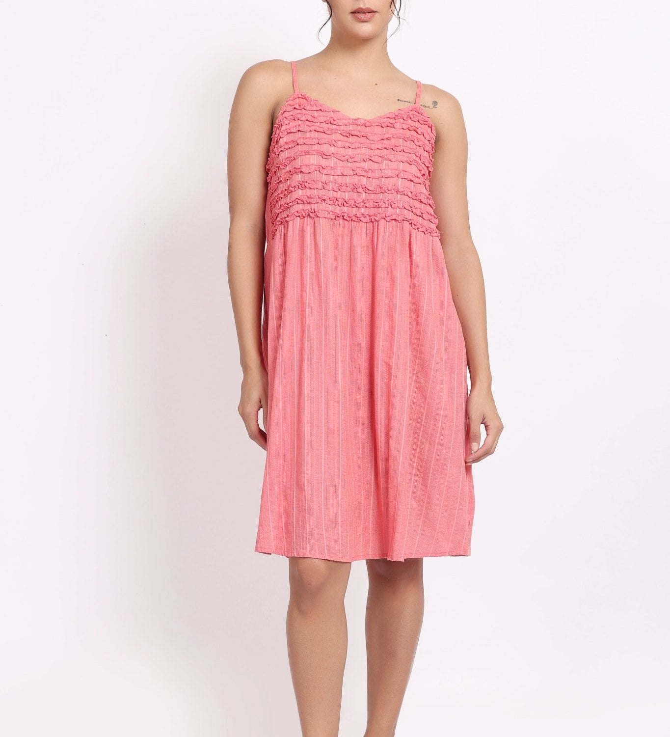 Model wearing coral self-stripe frilly nightie with spaghetti straps, front view.