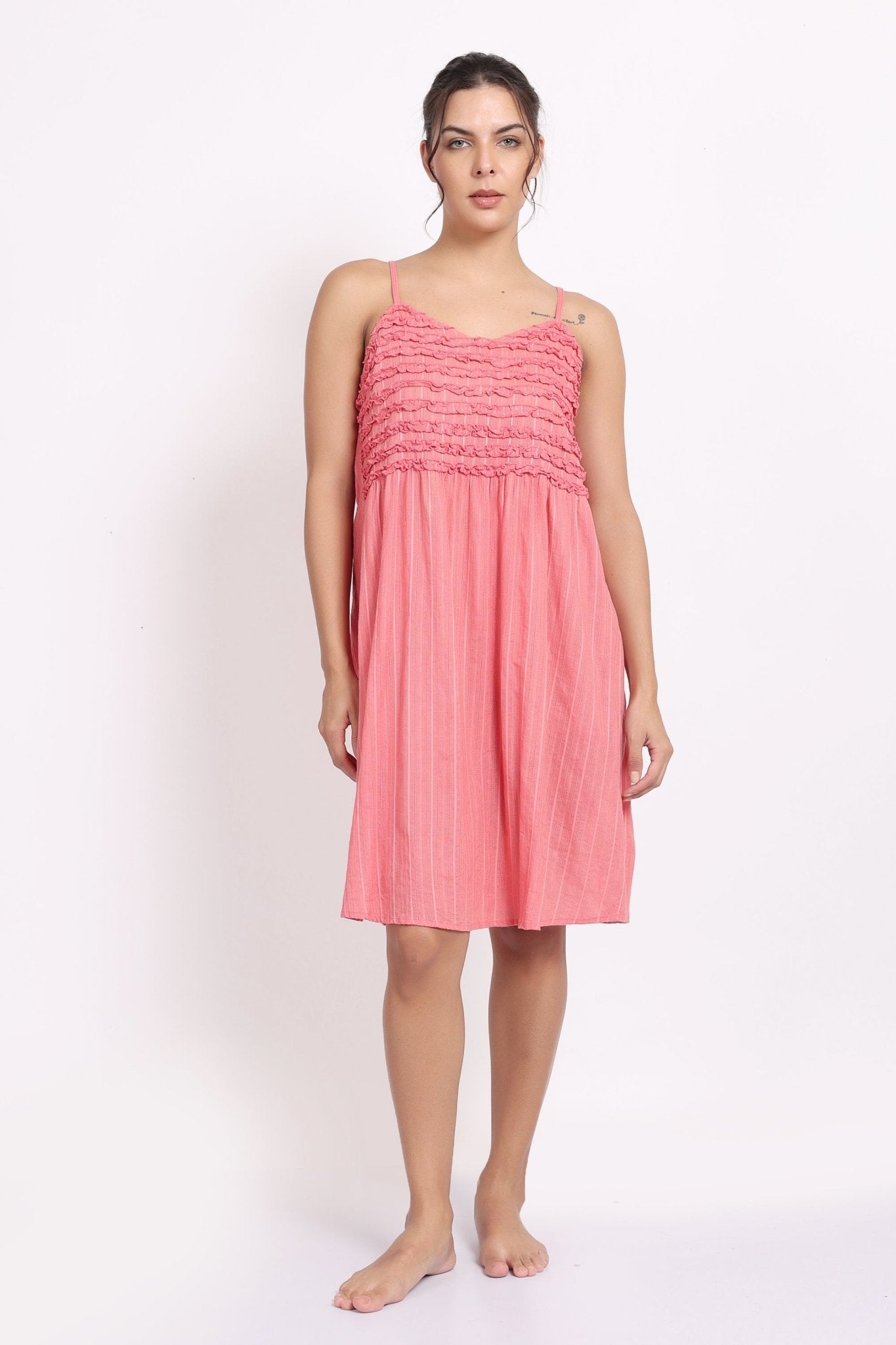 Model wearing coral self-stripe frilly nightie with spaghetti straps, front view.