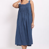 Front view of ocean blue cotton nightie with self-stripe pattern and delicate crochet straps.