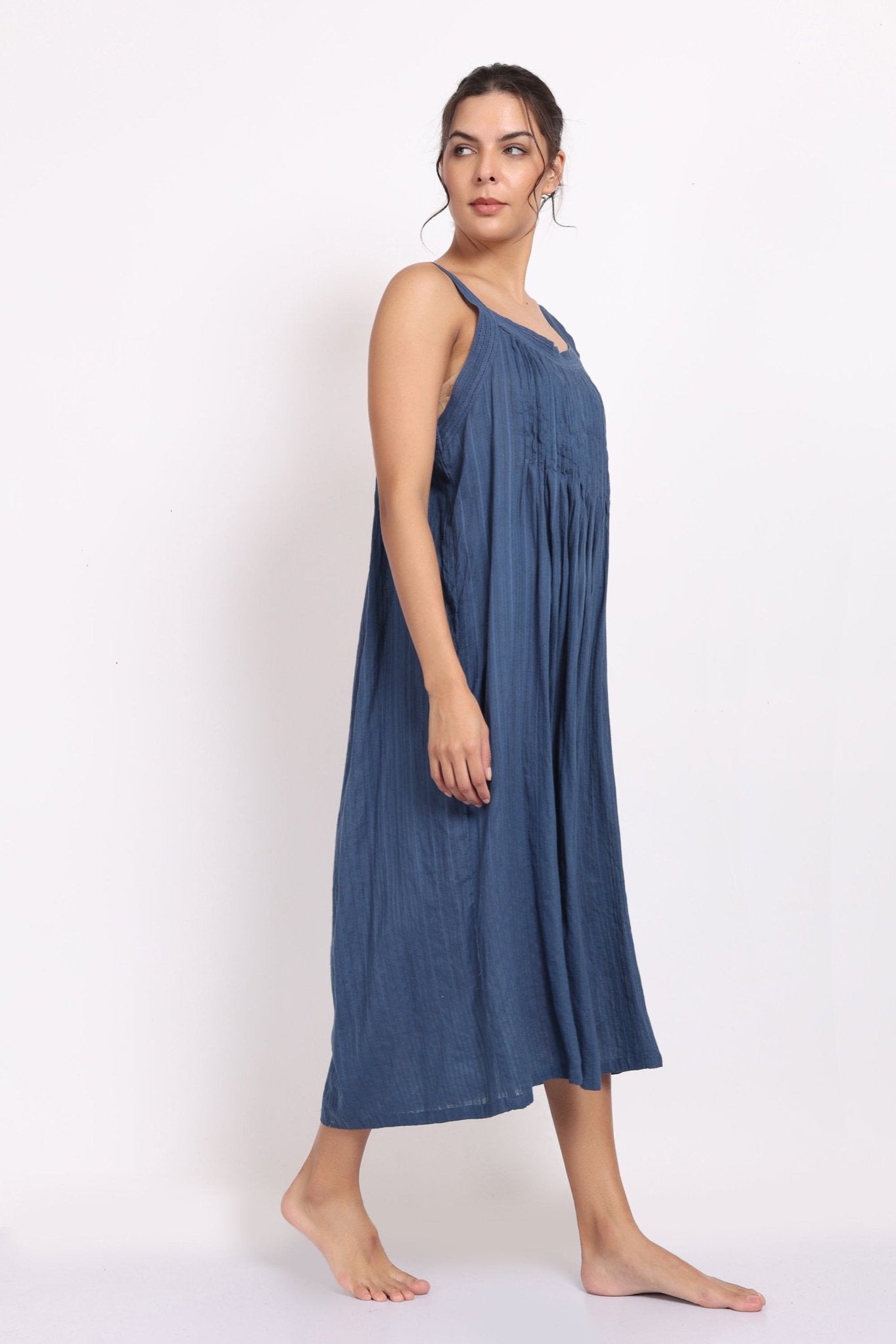 Side angle of nightie in blue cotton voile, highlighting its airy fabric and flattering flow.