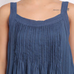 Close-up of crochet strap and pleated chest detail on Self Stripe Cotton Nightie in ocean blue.