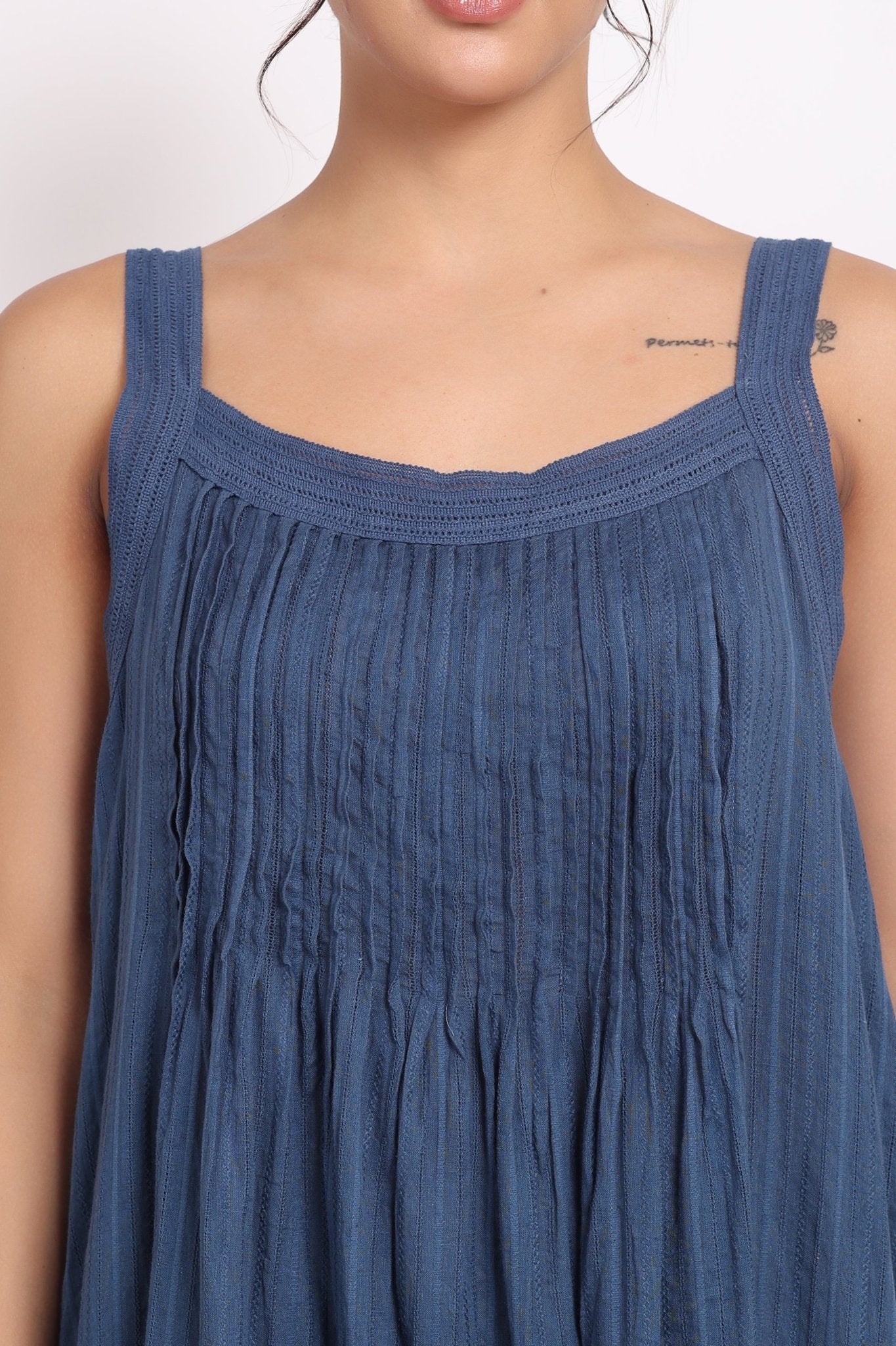 Close-up of crochet strap and pleated chest detail on Self Stripe Cotton Nightie in ocean blue.