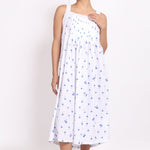 Model wearing Palm Print Strappy Nightie in navy palm print a breathable cotton nightie with pleated bust.
