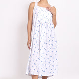 Model wearing Palm Print Strappy Nightie in navy palm print a breathable cotton nightie with pleated bust.