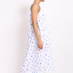 Side angle of Lotus by cotton strappy nightie showing soft drape and flowy fit with subtle pleating.
