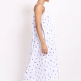Side angle of Lotus by cotton strappy nightie showing soft drape and flowy fit with subtle pleating.