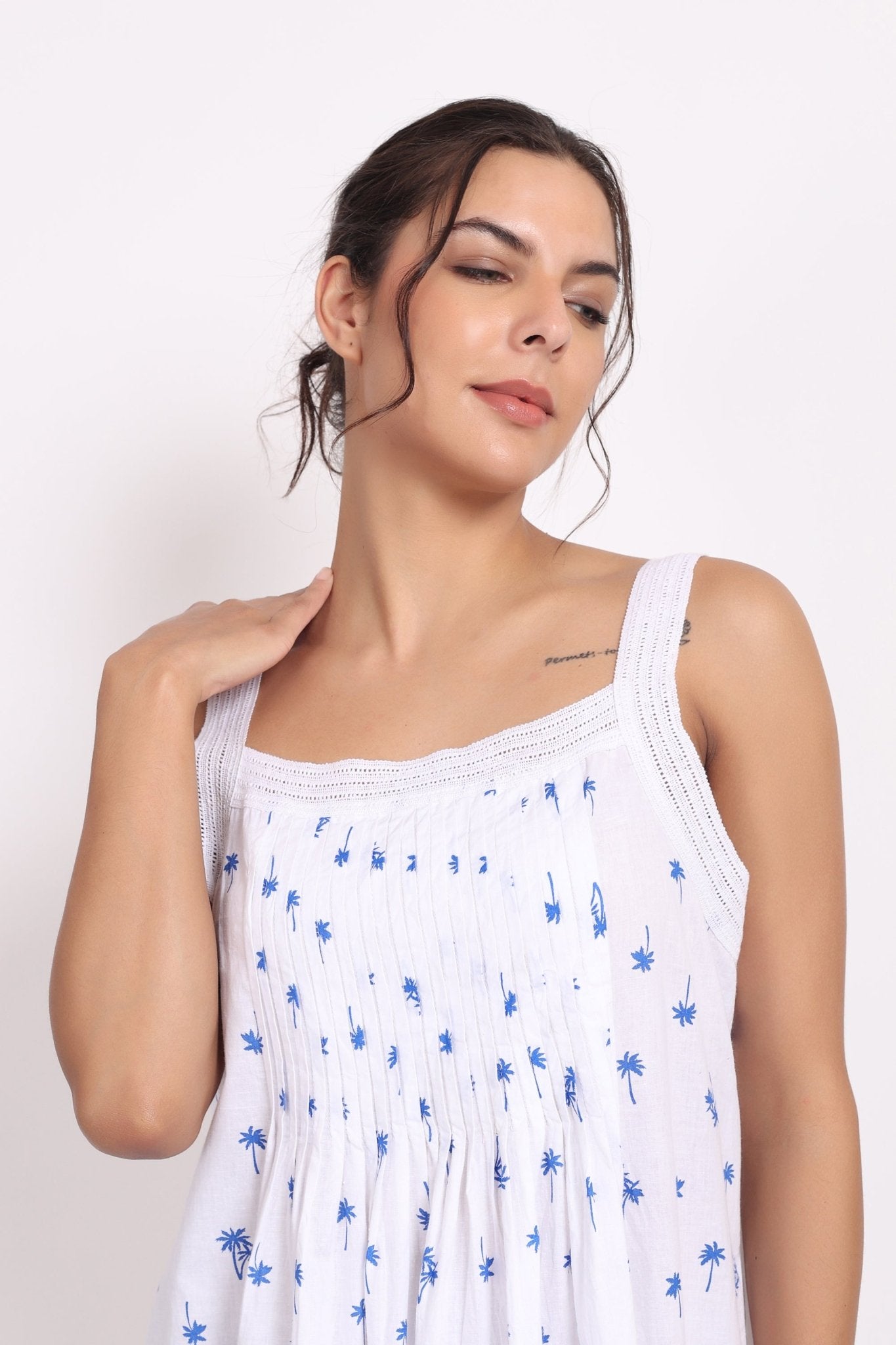 Detail shot of pleated neckline and crochet straps on the Palm Print Strappy Nightie by The Foundation Close up.