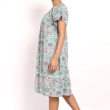 Side view of Bloom nightie highlighting flutter sleeves and knee-length cut.