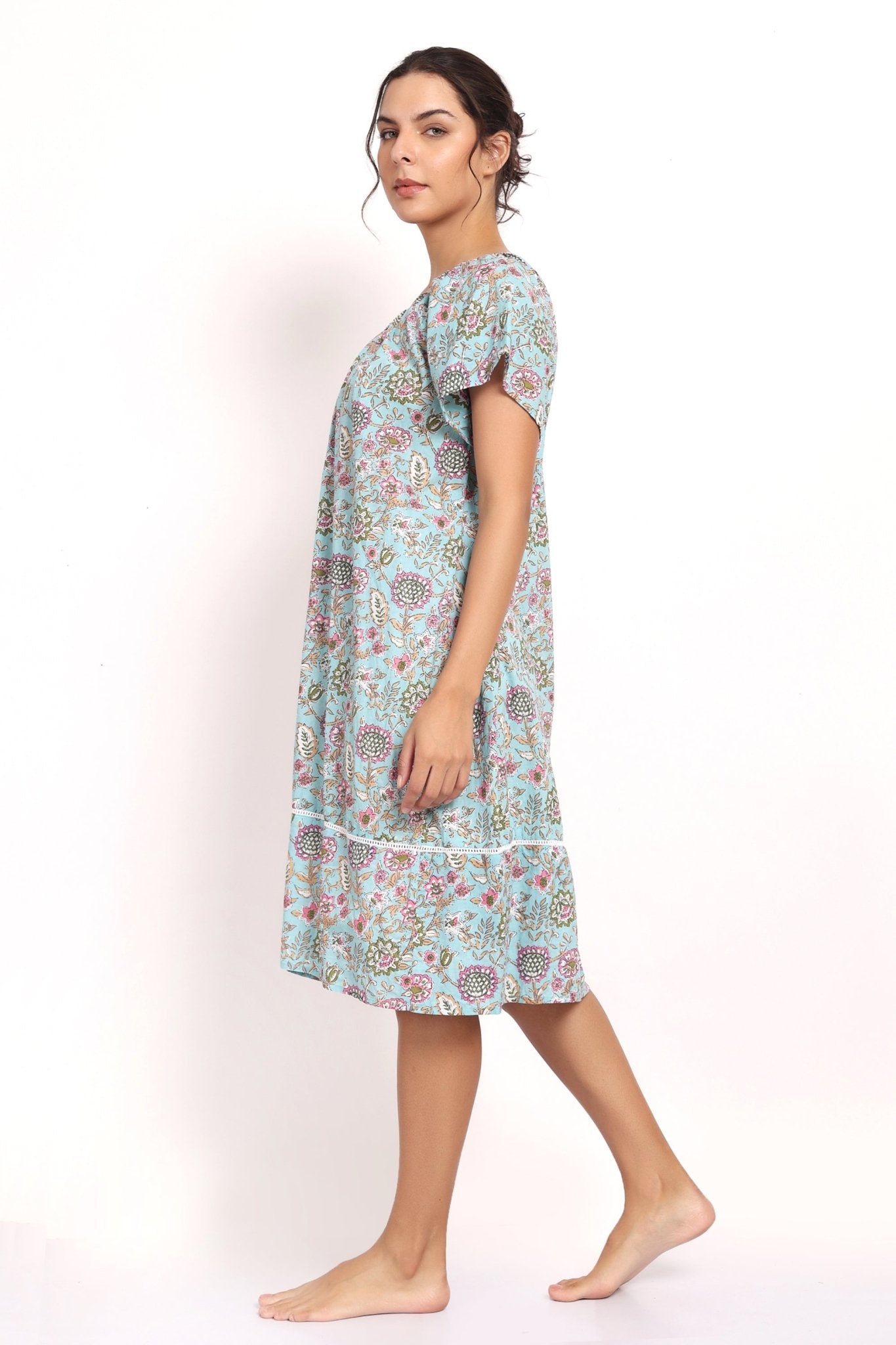 Side view of Bloom nightie highlighting flutter sleeves and knee-length cut.
