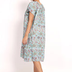 Profile view showing the nightie's movement and breathable fabric.