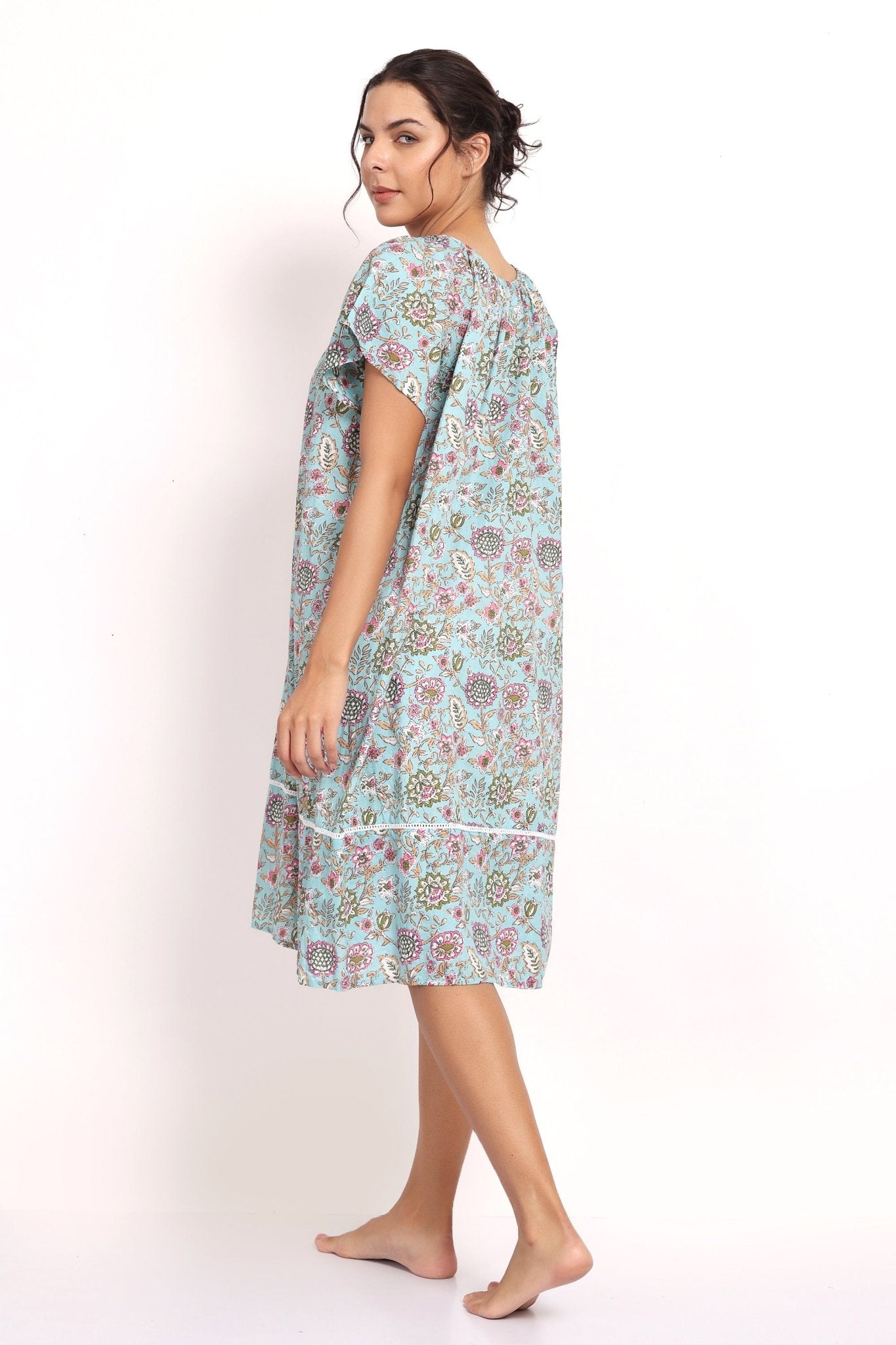 Profile view showing the nightie's movement and breathable fabric.