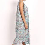 Side view of the Bloom Sleeveless Nightie showing movement and summery ease.