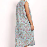 Back view of Bloom Nightie in aqua floral print, featuring airy silhouette and scooped hem.