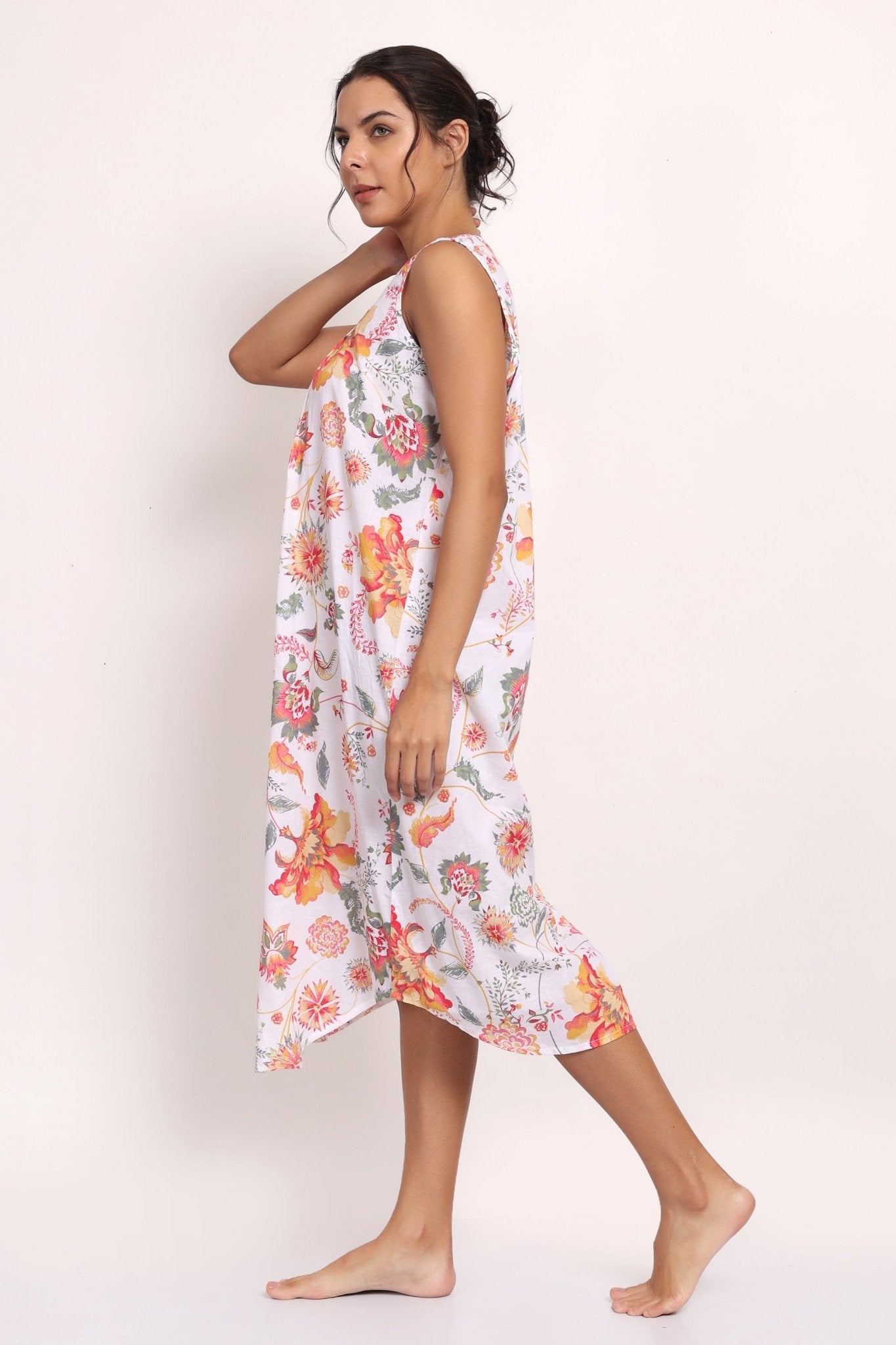 Profile shot showing the flowy cut and summer-friendly style of nightie. Side view