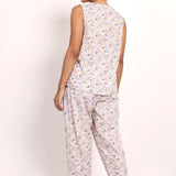 Back view of Model mid-step in Gatsby sleeveless PJ set—lightweight, breathable cotton sleepwear