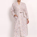 Front view of Model wearing the Gatsby cotton robe in sage pink floral print, front view tied at the waist.