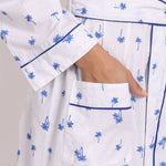 Close-up of side pocket detail and soft cotton fabric texture.