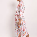 Side view of the Passionflower Kimono featuring front pocket and loose sleeves.