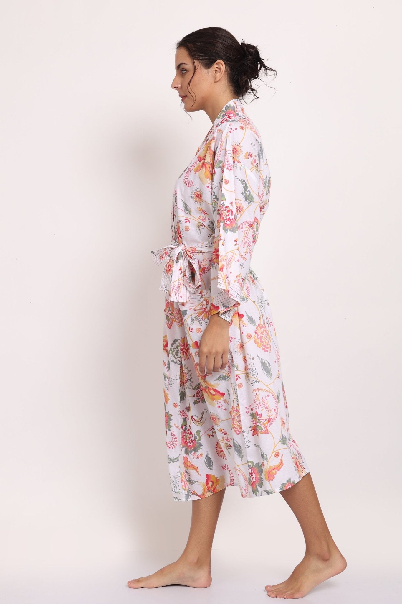 Side view of the Passionflower Kimono featuring front pocket and loose sleeves.