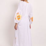 Back view of Romani sundress showing elasticized panel and loose fit.