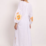 Back view of Romani sundress showing elasticized panel and loose fit.