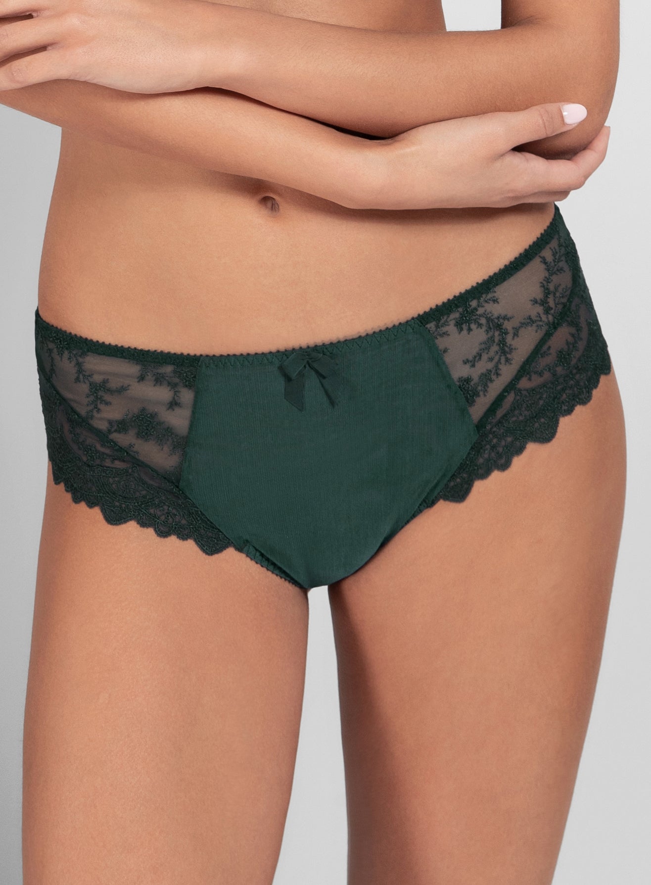 Close up of Model wearing the Louise Culotte Panty Brief in Sequoia by Empreinte, showcasing guipure lace detail and mid-rise cut.