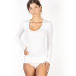 Woman wearing white modal scoop neck long sleeve top by EGI, designed for comfort and layering.