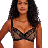 Front view of Freya Loveland Plunge Bra Bombshell Black styled with matching briefs and suspender belt, art deco lace and gemstone charm.