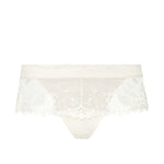 Flat lay of Simone Perele Wish Shorty Brief Natural laid flat elegant sheer tulle with Guipure floral embroidery and seamless design.