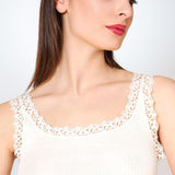 Close-up of Wool & Silk Lace Trimmed Camisole in ivory, showing delicate lace edging and ribbed knit texture.