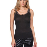 Model wearing Wool & Silk Lace Trimmed Camisole in black, featuring ribbed fabric, delicate straps, and elegant lace neckline.