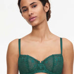 Model wearing Chantelle Day to Night Half Cup Bra in green – front view, available at The Foundation