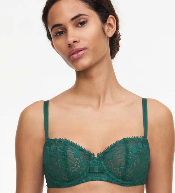 Model wearing Chantelle Day to Night Half Cup Bra in green – front view, available at The Foundation