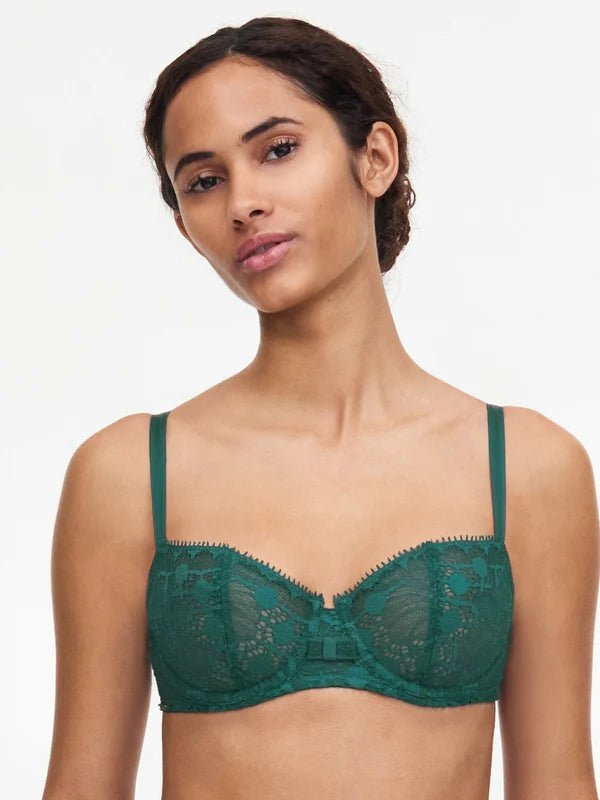 Model wearing Chantelle Day to Night Half Cup Bra in green – front view, available at The Foundation