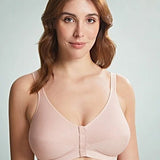 Younger model in Royce Comfi Cotton Wirefree Press Stud Front Open Bra Blush, demonstrating front press stud closure and full coverage fit, at The Foundation.

Younger model in Royce Comfi Cotton Wirefree Press Stud Front Open Bra Blush, demonstrating front press stud closure and full coverage fit, at The Foundation.