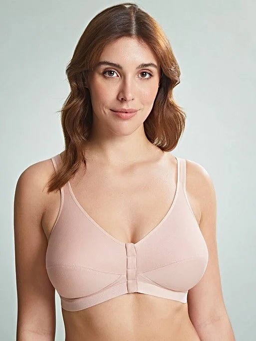 Younger model in Royce Comfi Cotton Wirefree Press Stud Front Open Bra Blush, demonstrating front press stud closure and full coverage fit, at The Foundation.

Younger model in Royce Comfi Cotton Wirefree Press Stud Front Open Bra Blush, demonstrating front press stud closure and full coverage fit, at The Foundation.