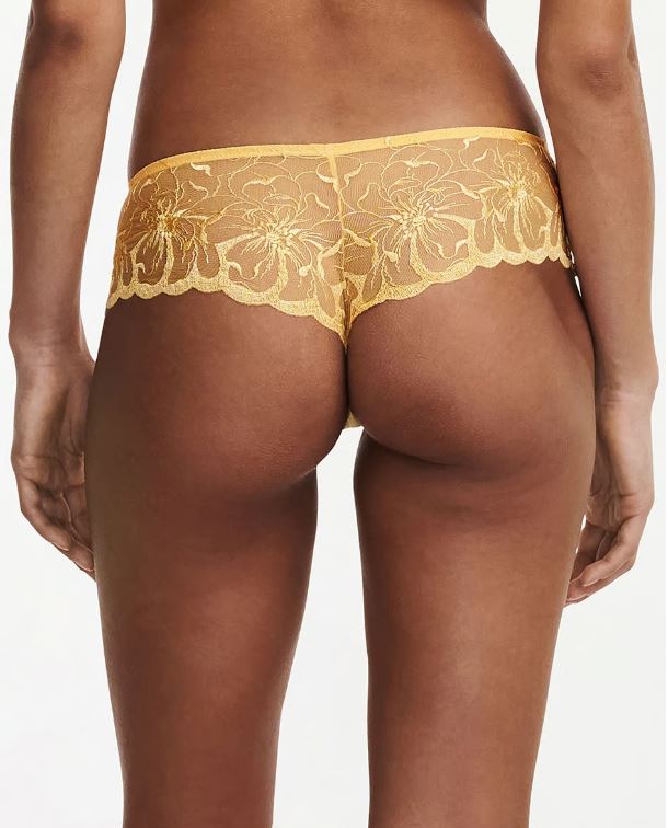 Back view of Fleurs Revealing Shorty Brief Tender Yellow from The Foundation, showing cheeky silhouette and detailed embroidery