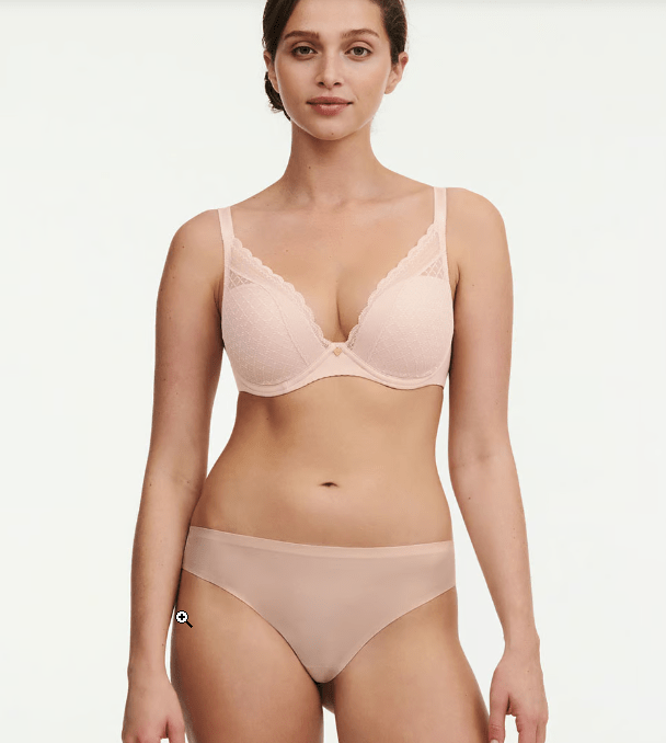 Model wearing Chantelle Norah Chic Plunge T-Shirt Bra Dusky Pink set showing matching bra and briefs in soft recycled fabric.