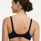 Back view of Chantelle Norah Chic Plunge T-Shirt Bra Black on model showing adjustable straps and J hook for racer back.