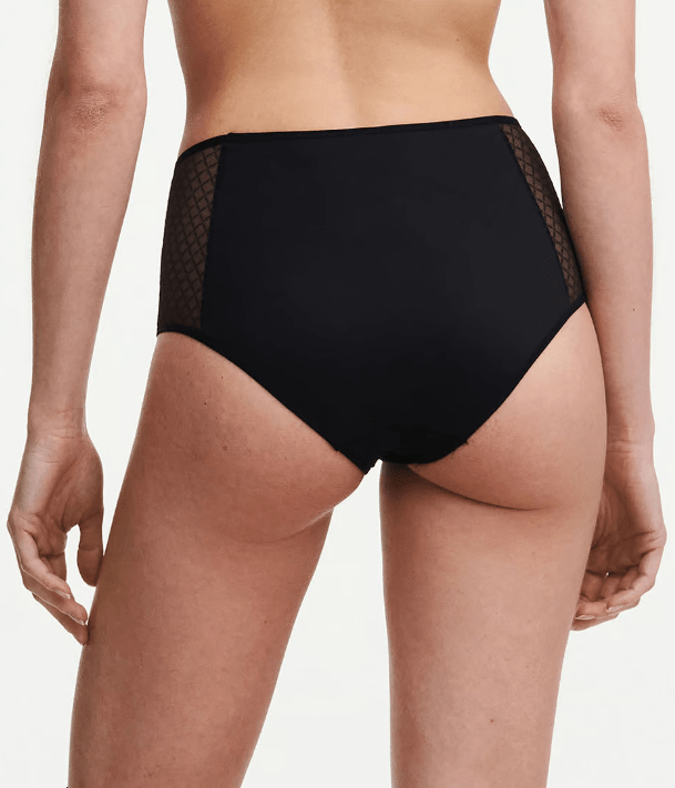 back angle of Chantelle Norah Chic High Waist Full Brief Black on model highlighting supportive fit and eco-designed fabrics.