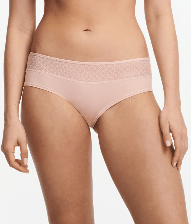 Front view of Chantelle Norah Chic Covering Shorty Brief Dusky Pink on model featuring soft eco-friendly fabric and graphic lace.