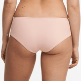 Back view of Chantelle Norah Chic Covering Shorty Brief Dusky Pink on model showing seamless hipster cut and comfy fit.