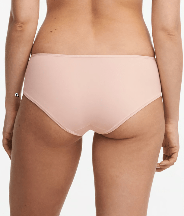 Back view of Chantelle Norah Chic Covering Shorty Brief Dusky Pink on model showing seamless hipster cut and comfy fit.